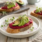Beetroot Hummus Avocado Toast on rustic bread