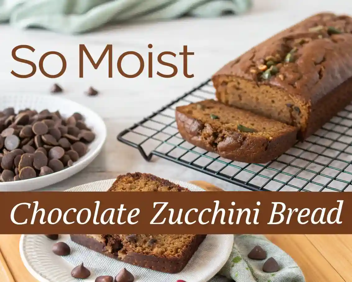 Best Moist Chocolate Zucchini Bread loaf with chocolate chips and zucchini