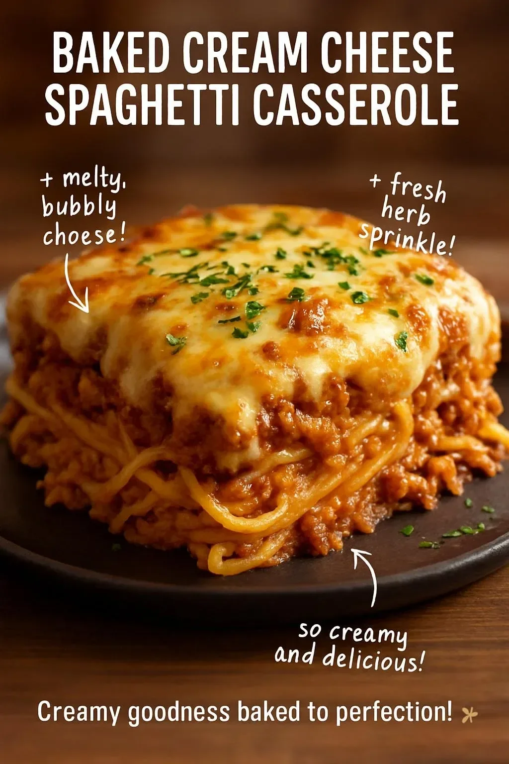 Baked Cream Cheese Spaghetti Casserole topped with herbs and cheese