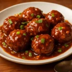 Cabbage Manchurian dish served with sauces and garnishes