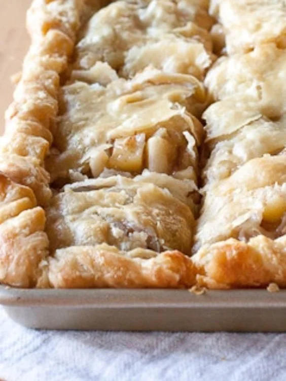 Delicious homemade Apple Slab Pie with a golden crust and apple filling